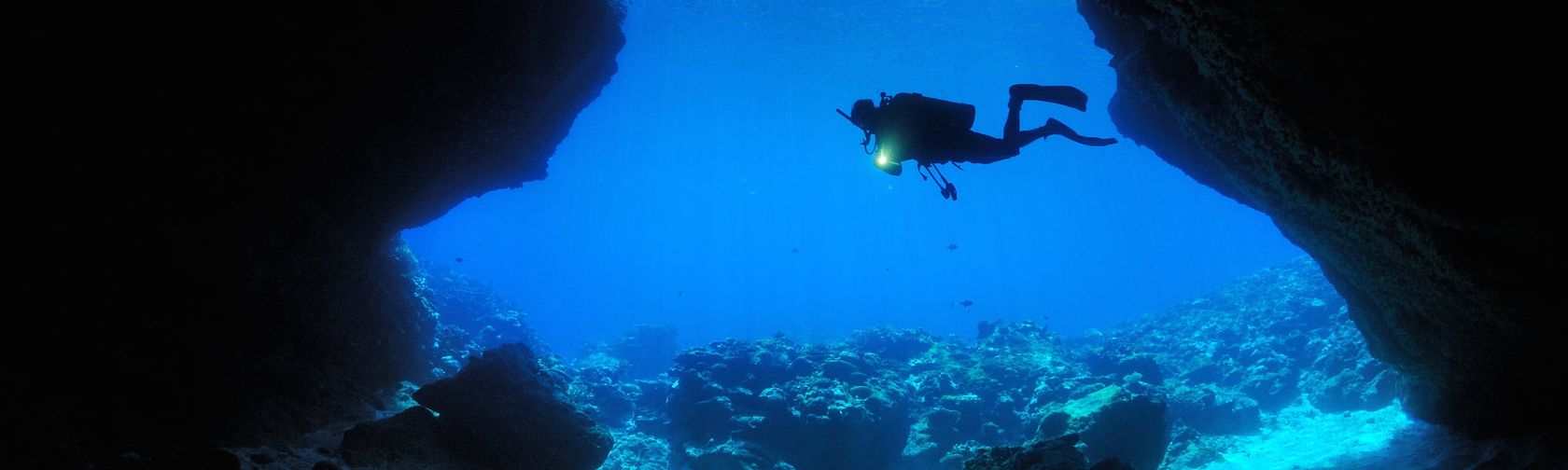 Diving Thundercliff Cave. Photo: Justin Gilligan / Christmas Island Tourism Association